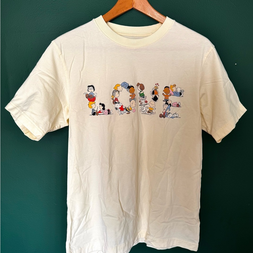 Uniqlo Cream Short Sleeve Tee with Artistic Design